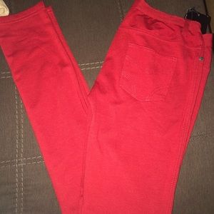 Red skinny jeans